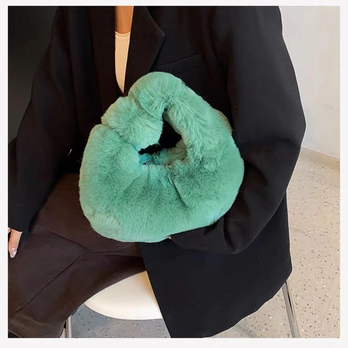 Plush dumpling bag in apricot colour, soft textured handheld handbag with polyester lining