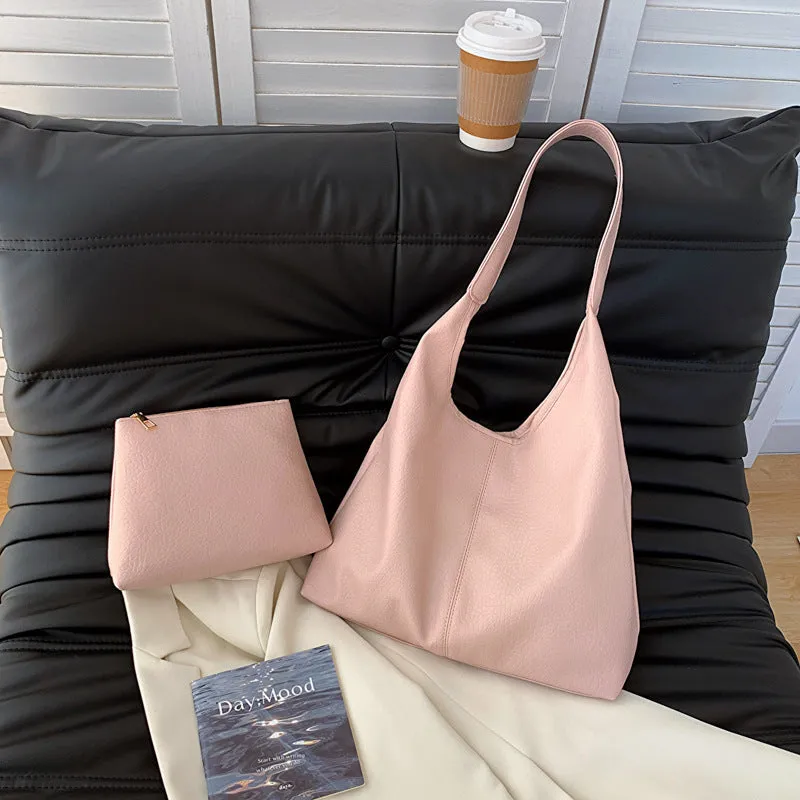 Women's large capacity soft PU shoulder bucket bag with contrast stitching in silver, front view