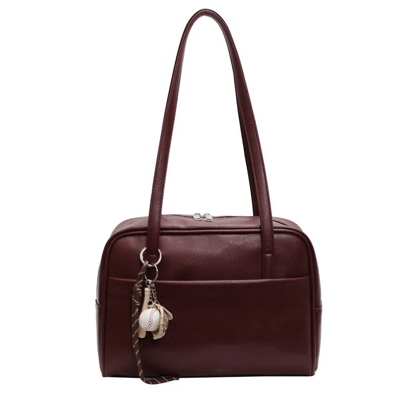 Women's urban simple PU bucket underarm bag with pendant detail in black, brown, coffee, and wine red colours.