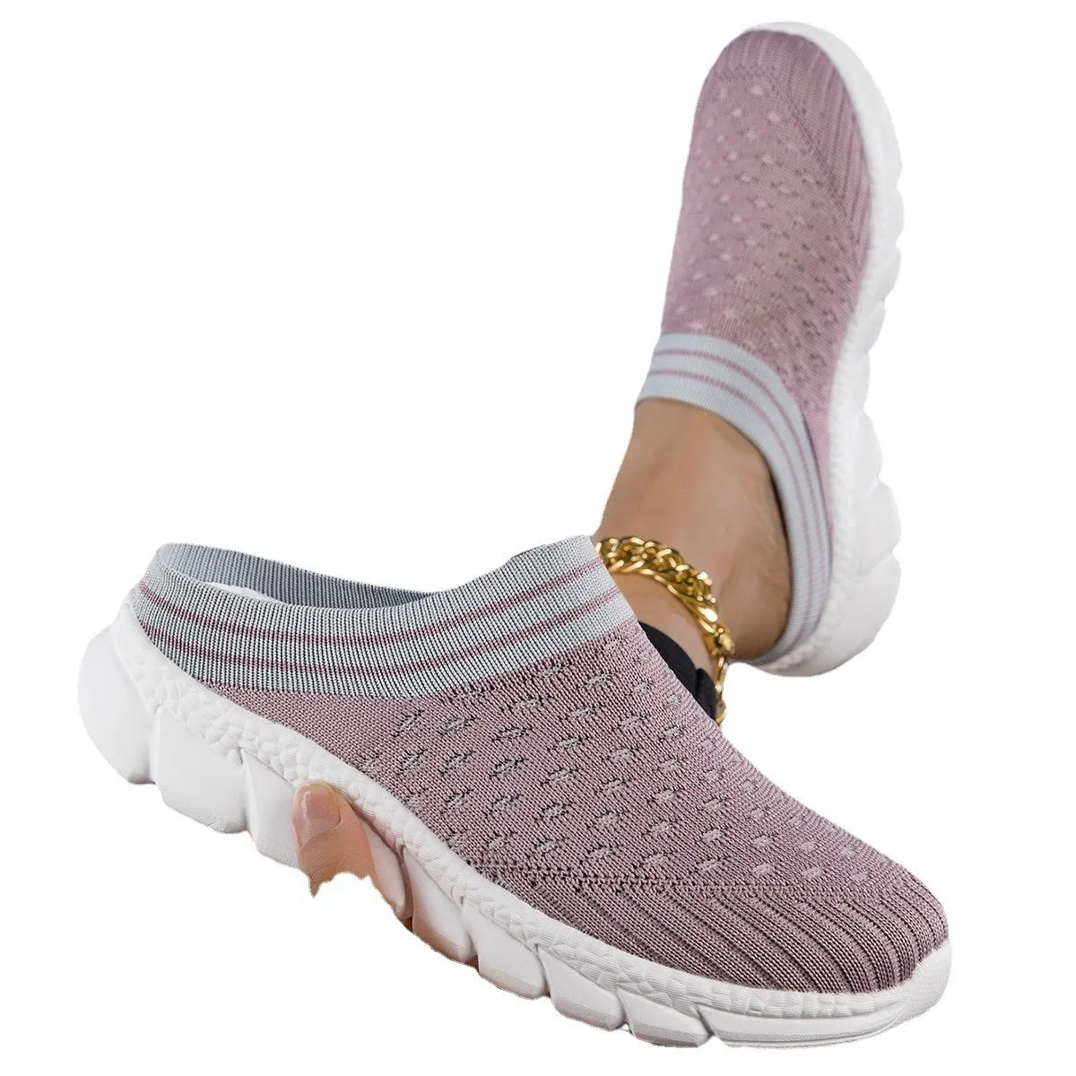 Women's black striped Flyknit slipper shoes with hollowed-out design on a viscose sole.