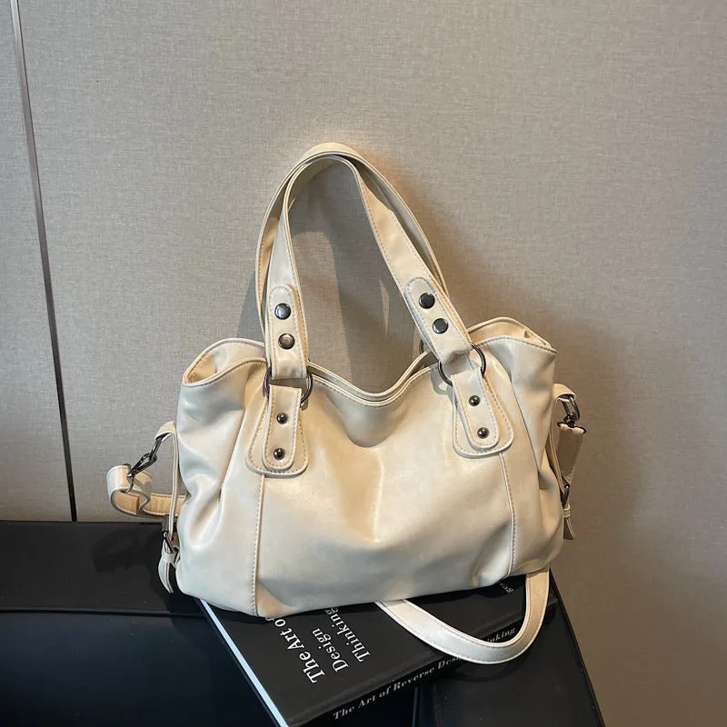 Large capacity women's messenger bag in soft PU leather, horizontal square shape, with double shoulder straps, available in multiple colours