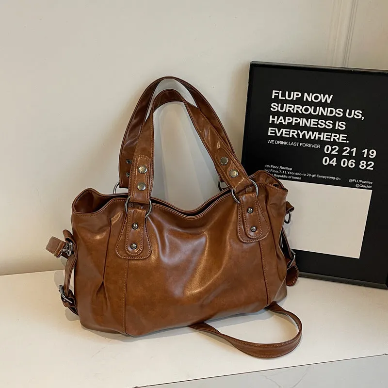Large capacity women's messenger bag in soft PU leather, horizontal square shape, with double shoulder straps, available in multiple colours