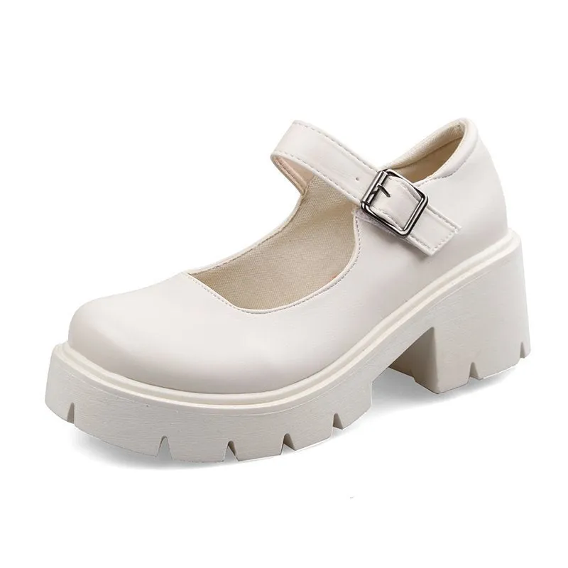 Women's buckle British style patent leather shoes in beige with round toe and low top, side view