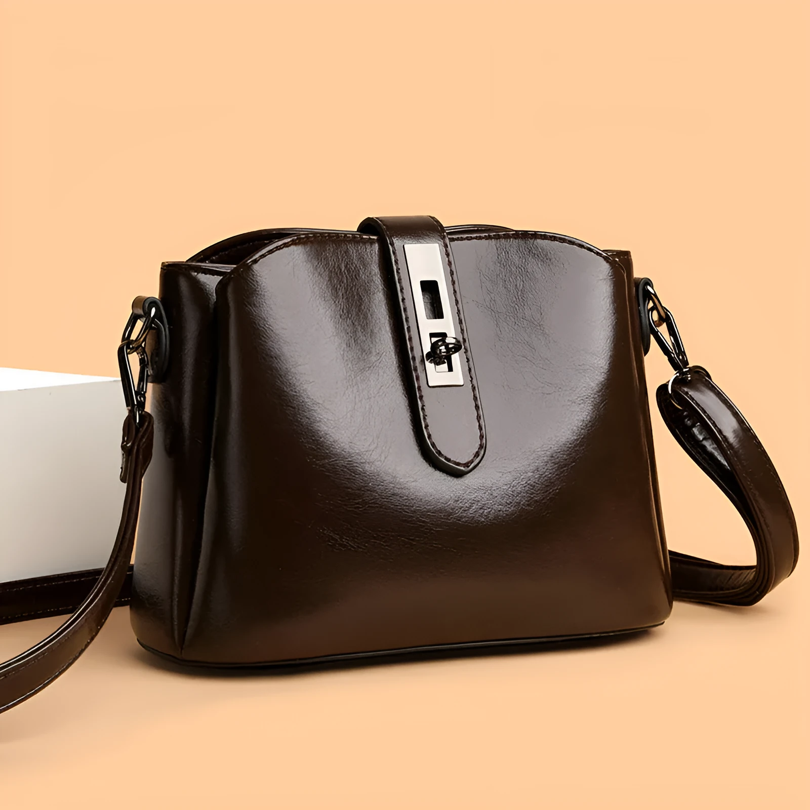 Retro women's messenger bag in PU material with medium hardness and sandwich pocket, available in white black brown