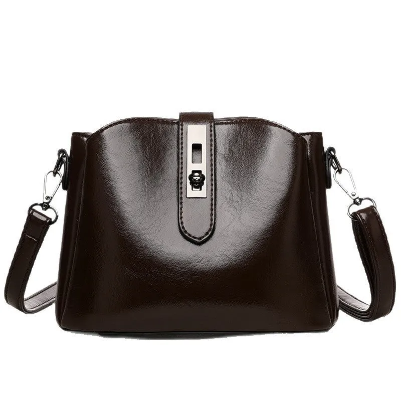 Retro women's messenger bag in PU material with medium hardness and sandwich pocket, available in white black brown
