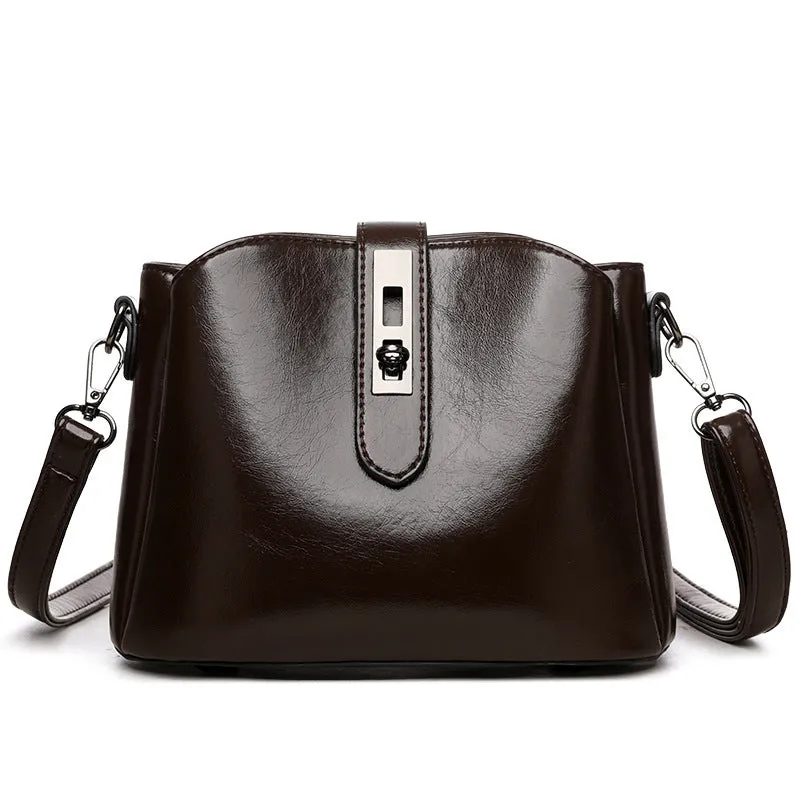 Retro women's messenger bag in PU material with medium hardness and sandwich pocket, available in white black brown