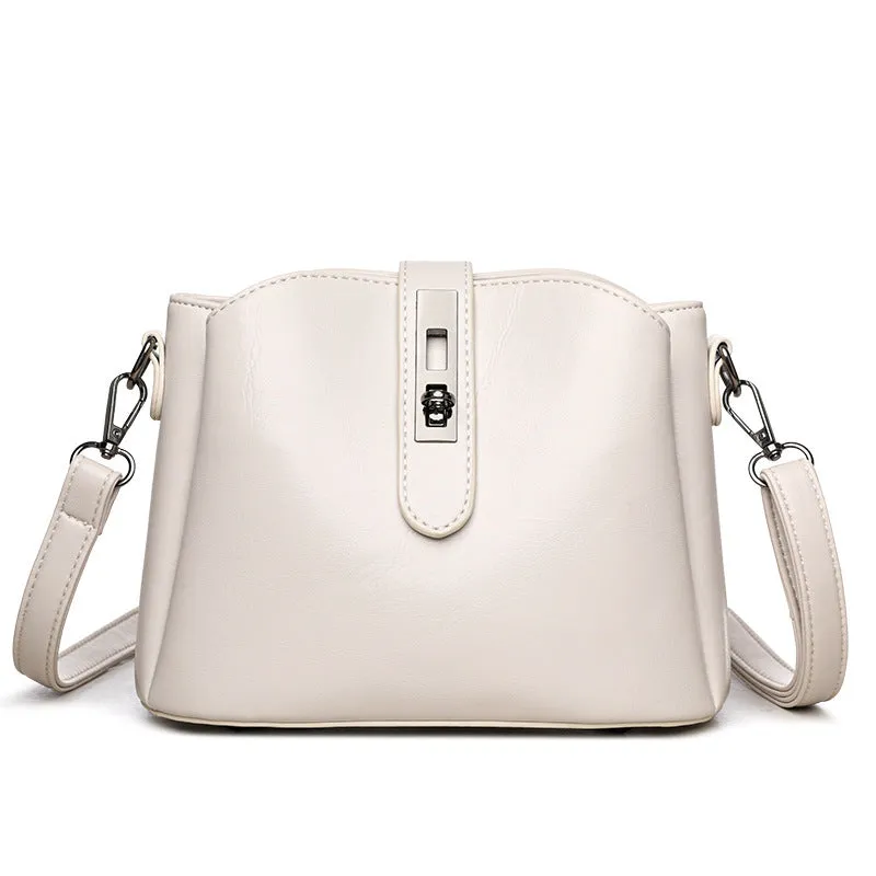 Retro women's messenger bag in PU material with medium hardness and sandwich pocket, available in white black brown