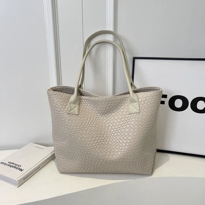 Woven PU shoulder bag for women with double straps, available in beige, black, gray, and khaki