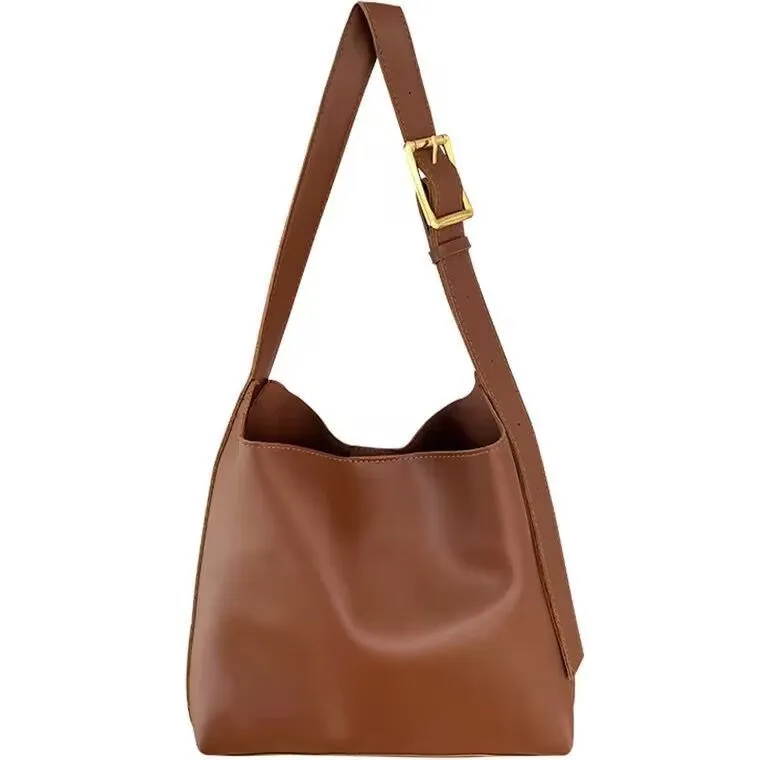 Women's soft PU shoulder bag with swing threads decoration showing black and brown colour options