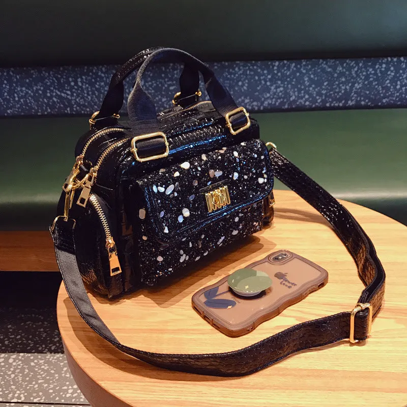 Large capacity black cowhide shoulder bag with diamond pattern for women, suitable for leisure travel and casual daily use.