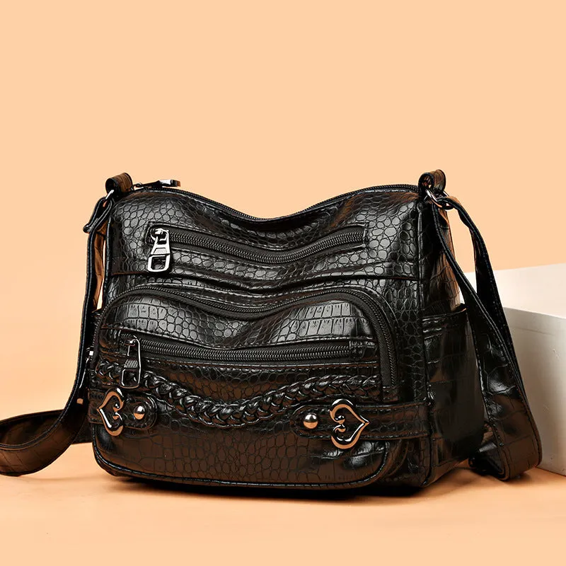 Large capacity knitted messenger bag in brown with PU leather trim, zip closure, and outer pocket, 23x11x17cm