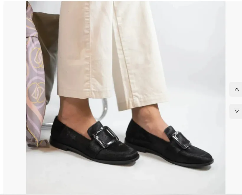 Low-cut black loafers for women with large square button and rhinestone details, round toe, low heel