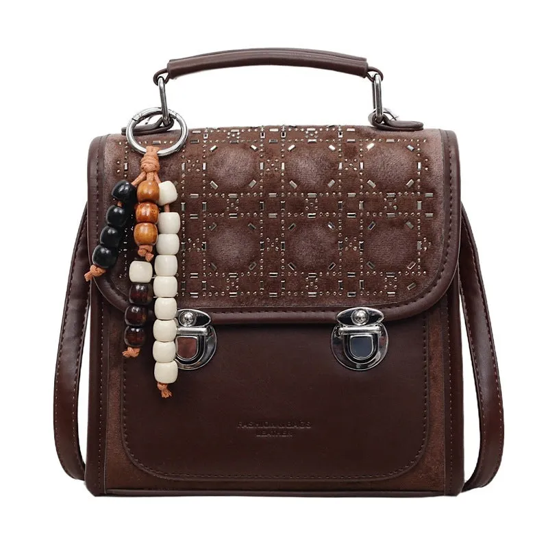 Small square PU leather messenger backpack for women with texture finish in black colour