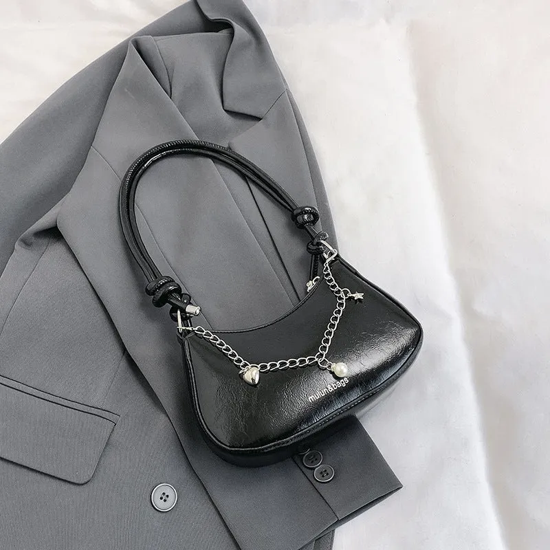 PU one-shoulder crossbody commuter bag horizontal square shape with chain accent in black