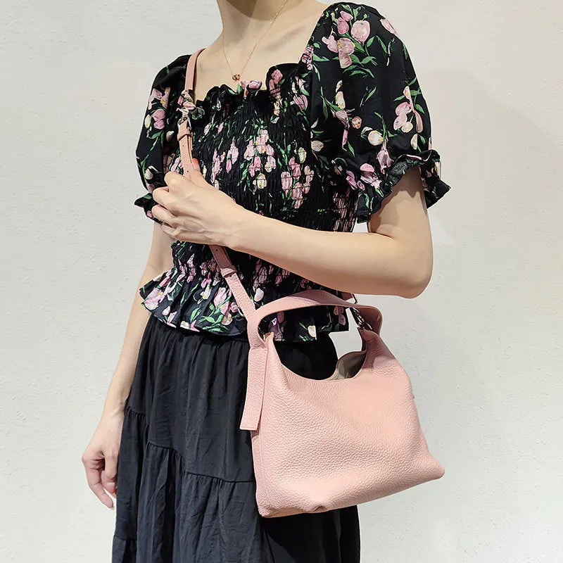 Casual first layer cowhide women's handbag in soft pillow shape with sewing line detail and single shoulder strap