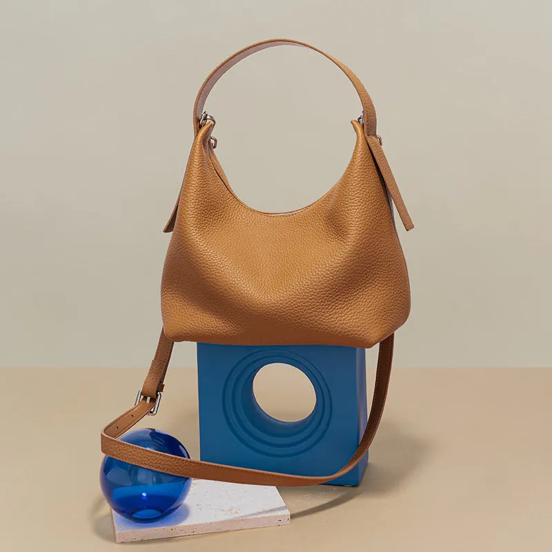 Casual first layer cowhide women's handbag in soft pillow shape with sewing line detail and single shoulder strap