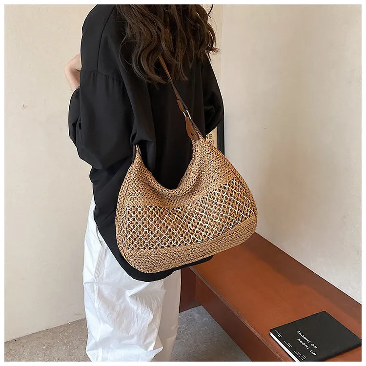 Women's straw cross body bag in khaki colour with horizontal square shape and cross body strap