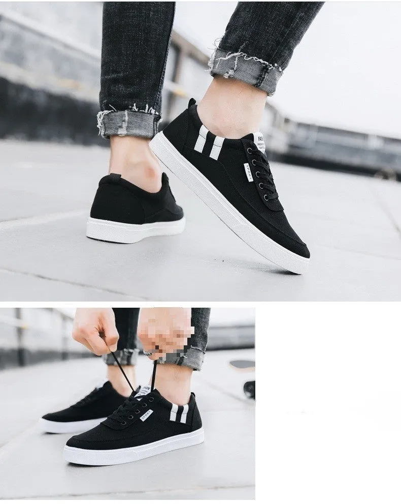 Men's black cloth cover low top canvas shoes with lace-up closure and rubber sole