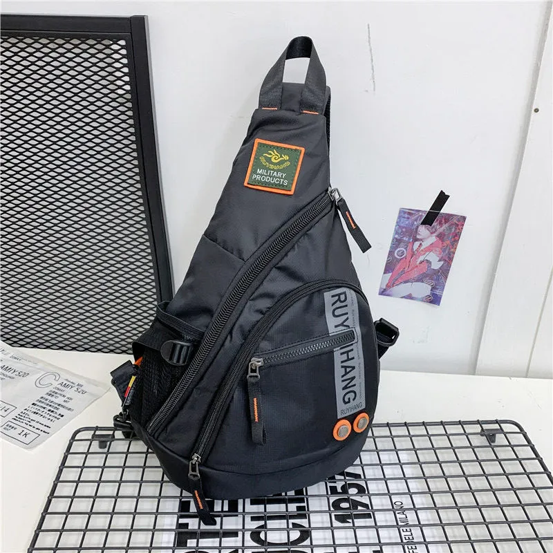 Unisex outdoor large capacity nylon chest bag in black with ventilation slots and adjustable strap