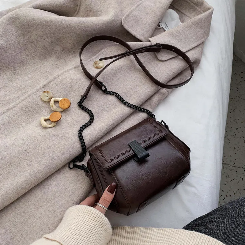 Korean style PU shoulder crossbody bag in beige with clamshell opening and crossbody strap