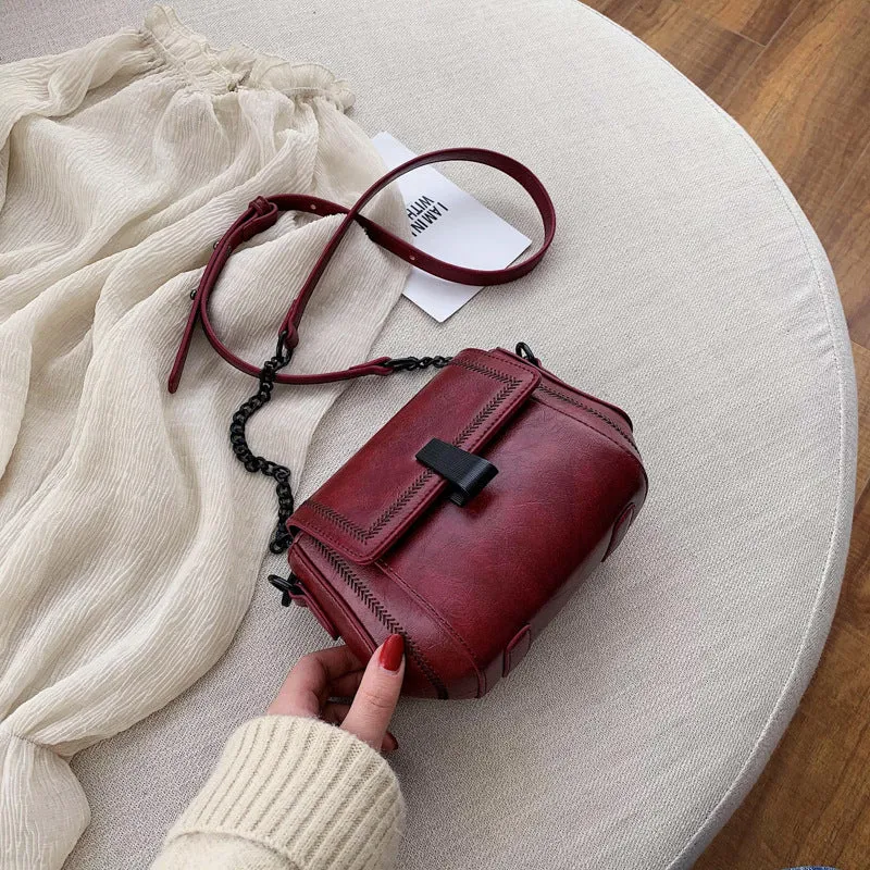 Korean style PU shoulder crossbody bag in beige with clamshell opening and crossbody strap
