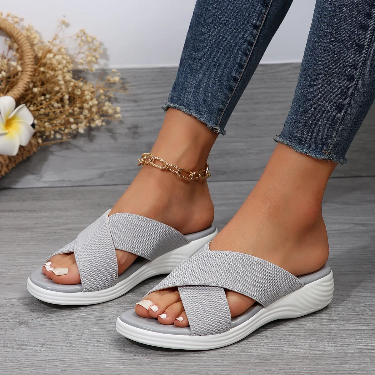 Black romantic style women's wedge slippers with cross strap and thick rubber sole