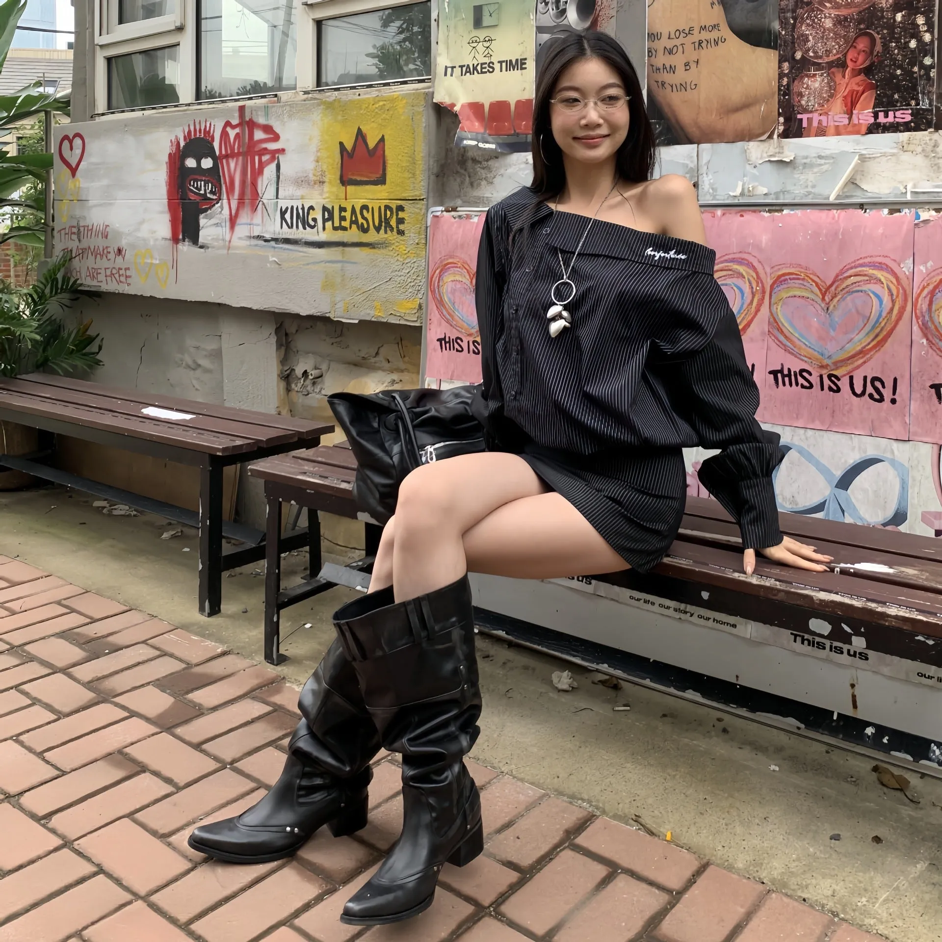 Black pointed toe chunky heel slimming boots with leather lining and high cylinder sock, side view on white background