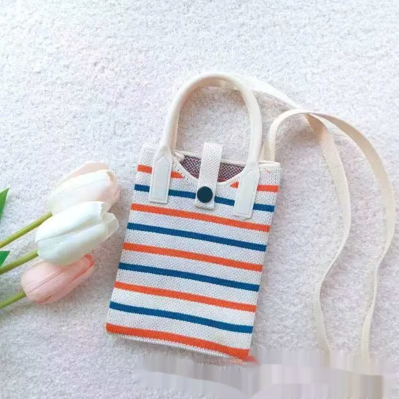Women's polyester crossbody handbag in square vertical shape with striped pattern