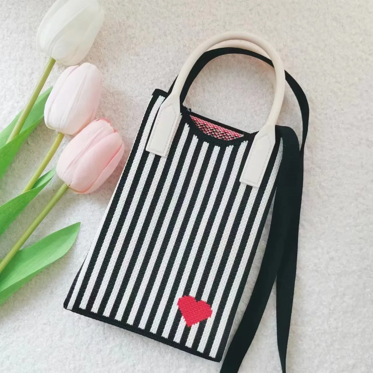 Women's polyester crossbody handbag in square vertical shape with striped pattern