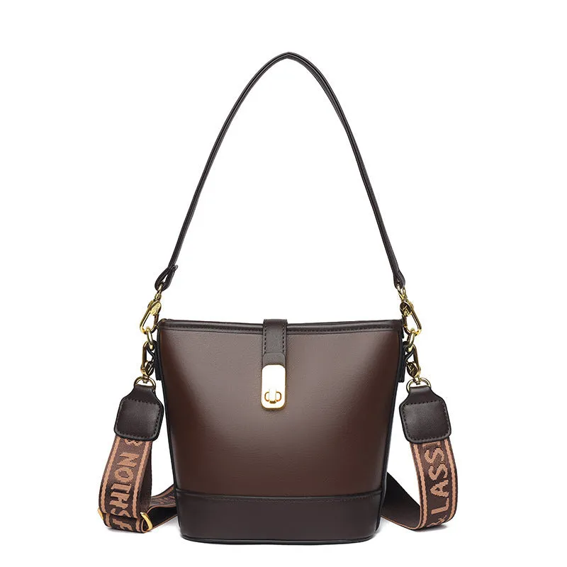 Korean-style black bucket messenger bag with double shoulder straps showing internal organiser compartments