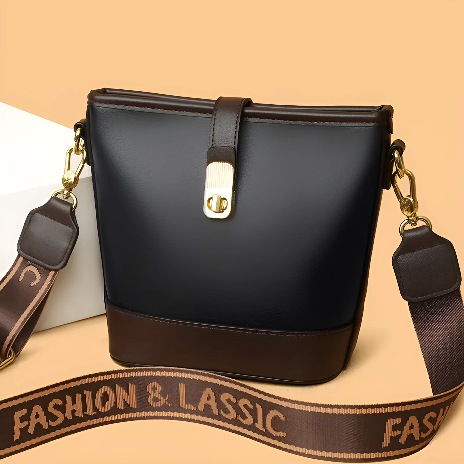 Korean-style black bucket messenger bag with double shoulder straps showing internal organiser compartments