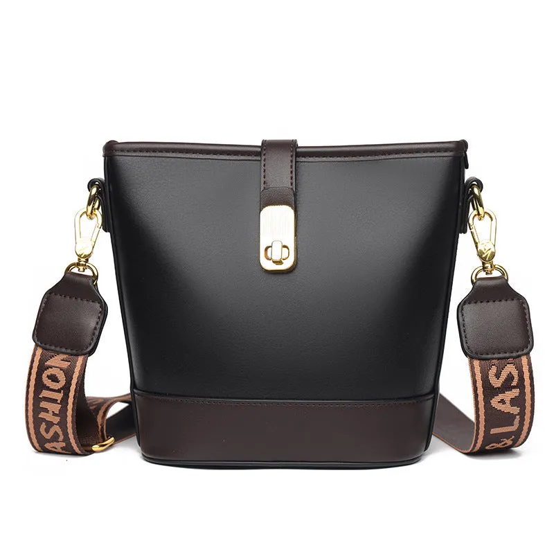 Korean-style black bucket messenger bag with double shoulder straps showing internal organiser compartments
