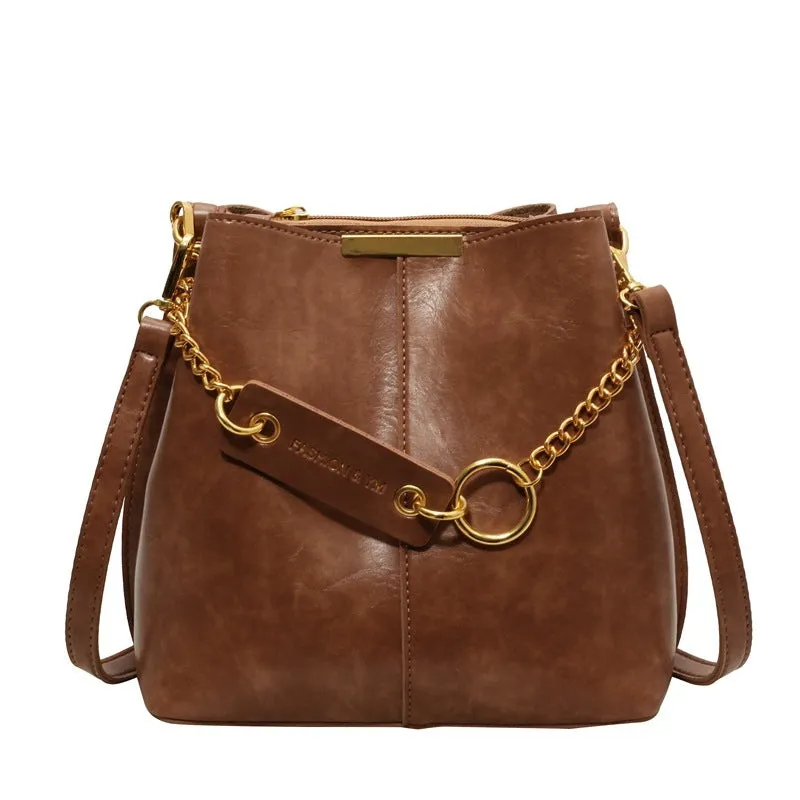 Large capacity PU shoulder bag with wide strap in black colour, sewing thread detail, crossbody style