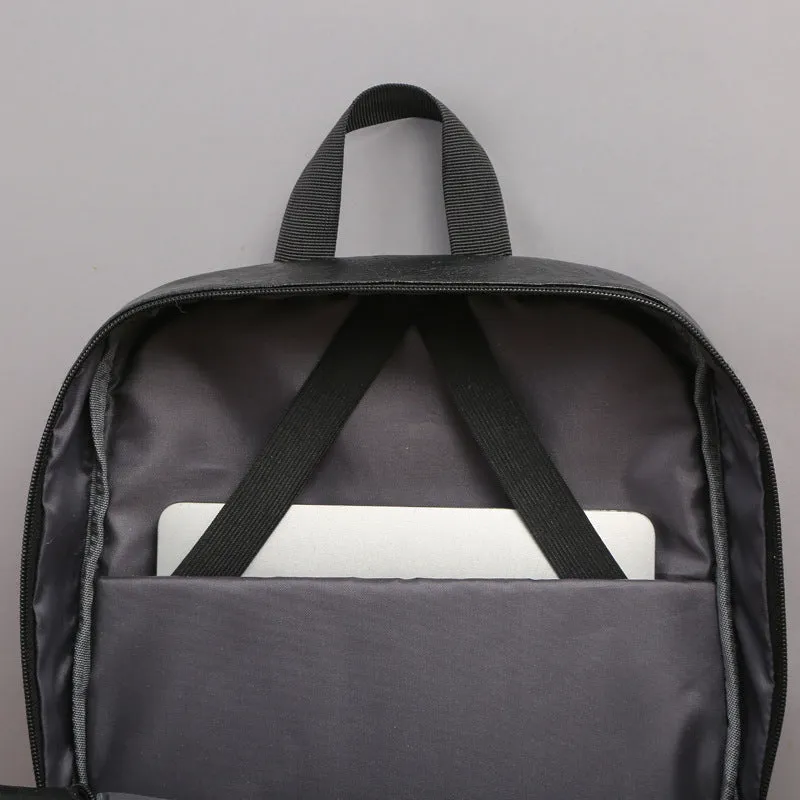 Black casual men's large capacity backpack with PU leather exterior and polyester lining