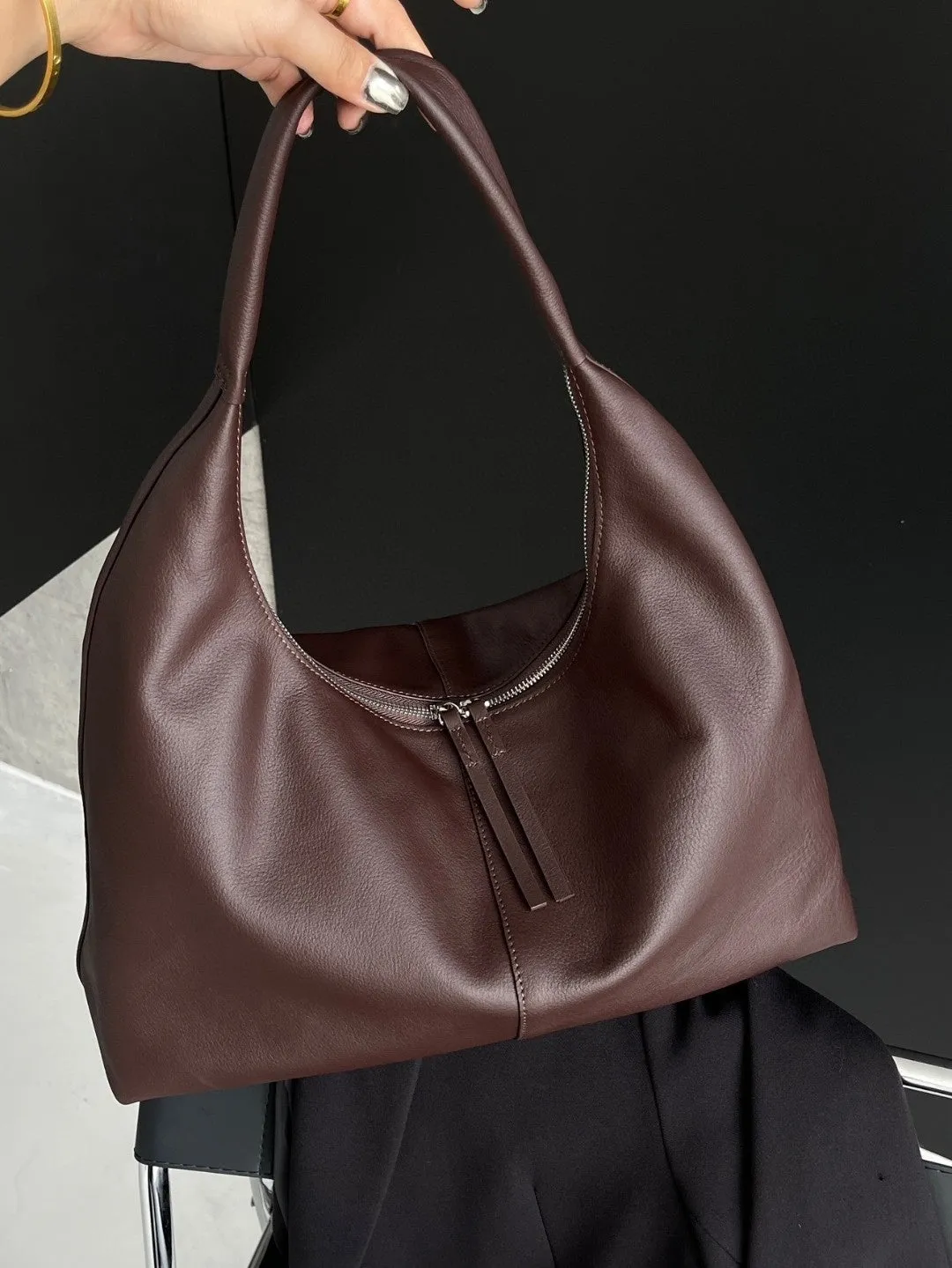 Genuine leather crescent underarm bag in ankarat red with sandwich pocket and single shoulder strap