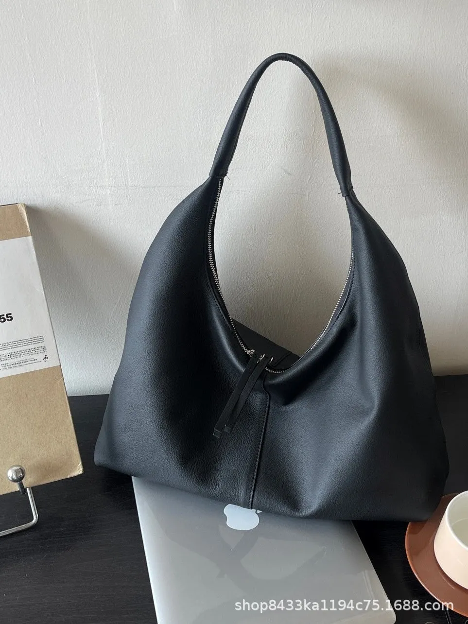 Genuine leather crescent underarm bag in ankarat red with sandwich pocket and single shoulder strap