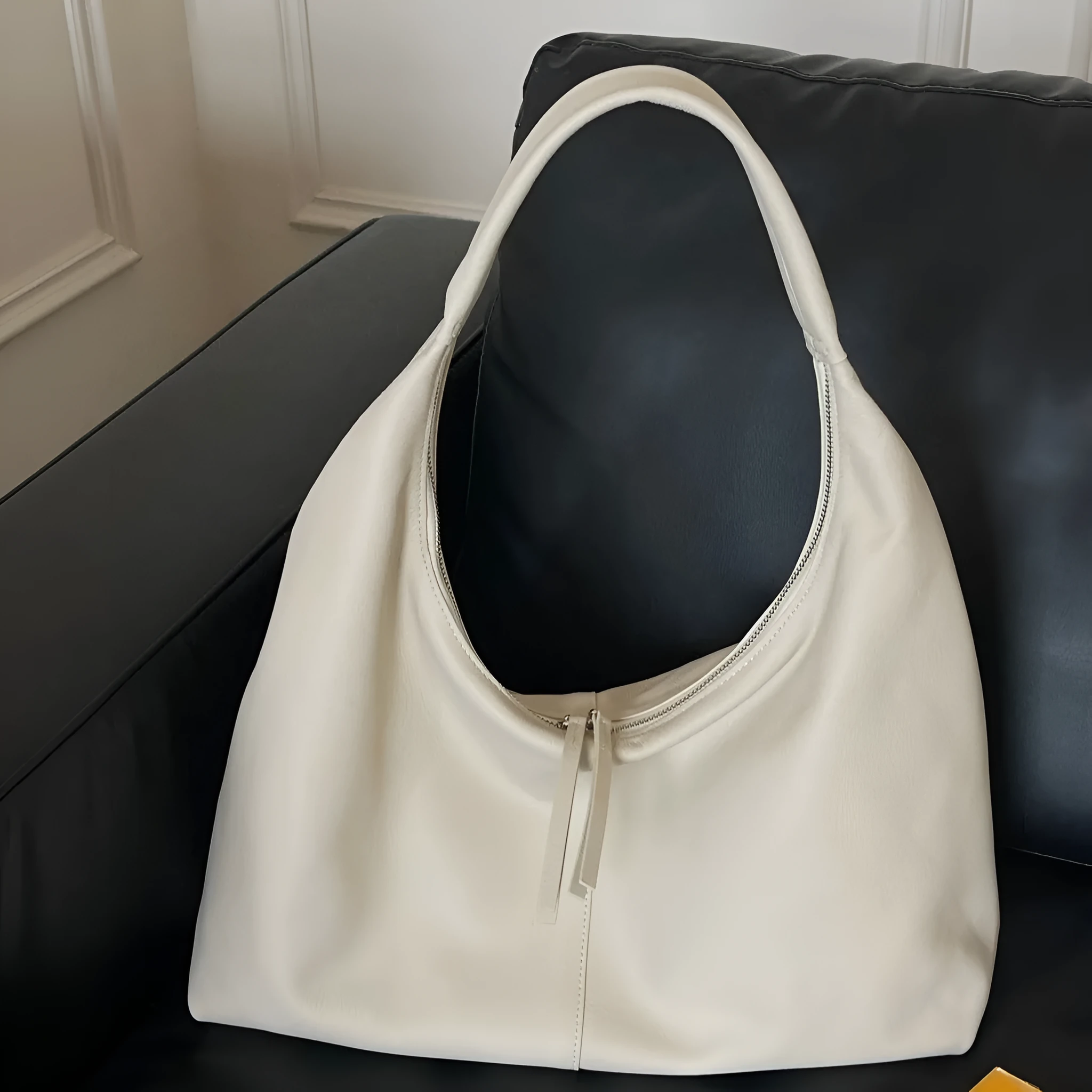 Genuine leather crescent underarm bag in ankarat red with sandwich pocket and single shoulder strap
