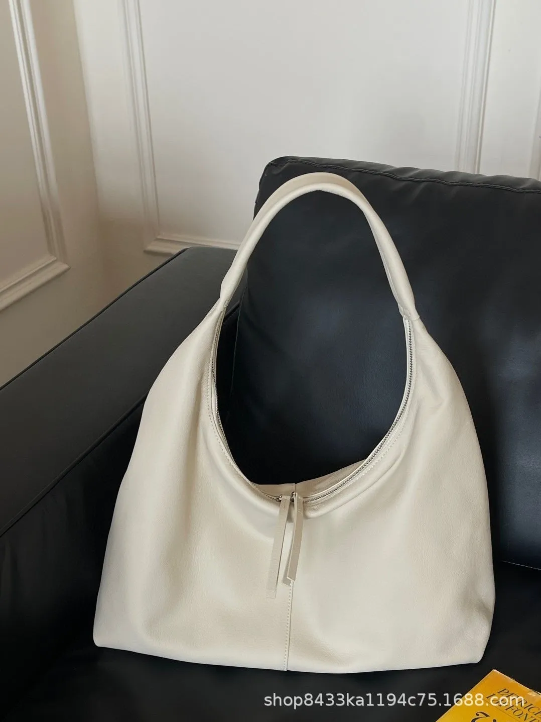 Genuine leather crescent underarm bag in ankarat red with sandwich pocket and single shoulder strap
