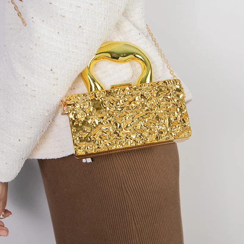 Mini acrylic crossbody bag with chain strap in Silver Corrugated colour