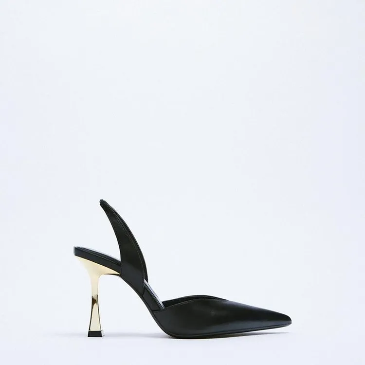 Women's pointed patent leather high heels in apricot colour on a white background.