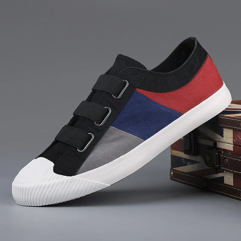 Men's canvas sneakers with rubber sole in multiple colour options showing low top design and elastic band