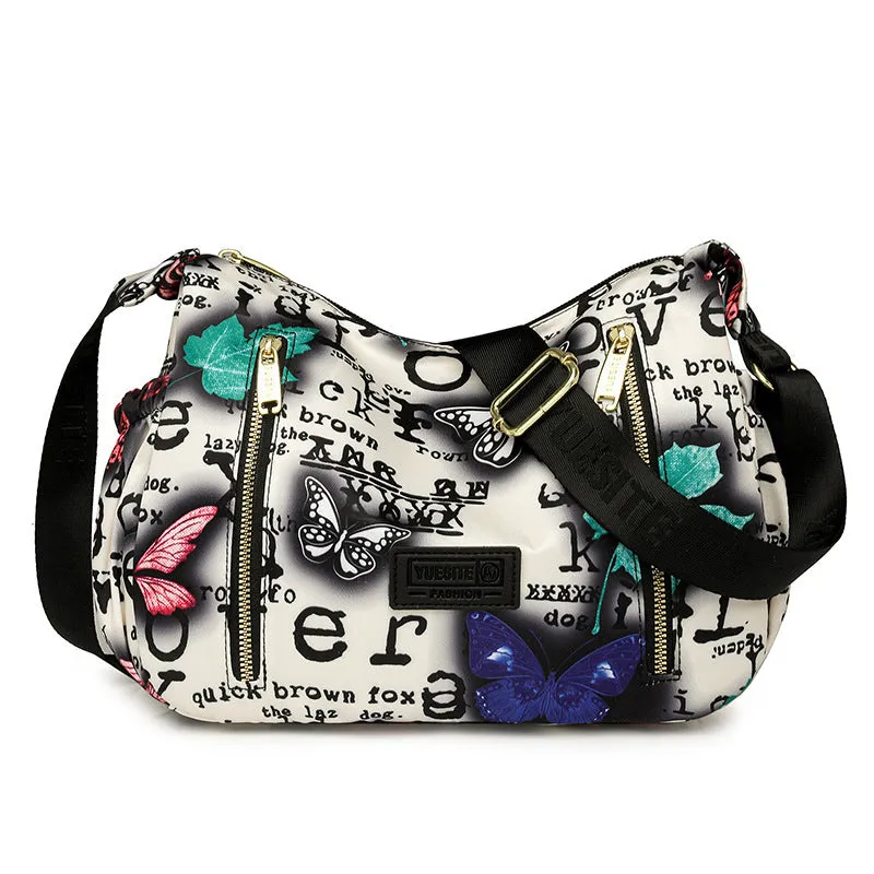 Graffiti casual crossbody bag in nylon with sewing line and print details, medium-soft build, single strap, dumpling shape