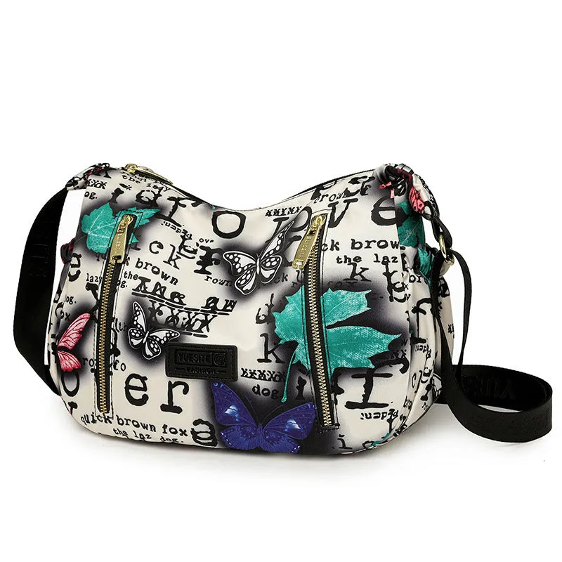 Graffiti casual crossbody bag in nylon with sewing line and print details, medium-soft build, single strap, dumpling shape