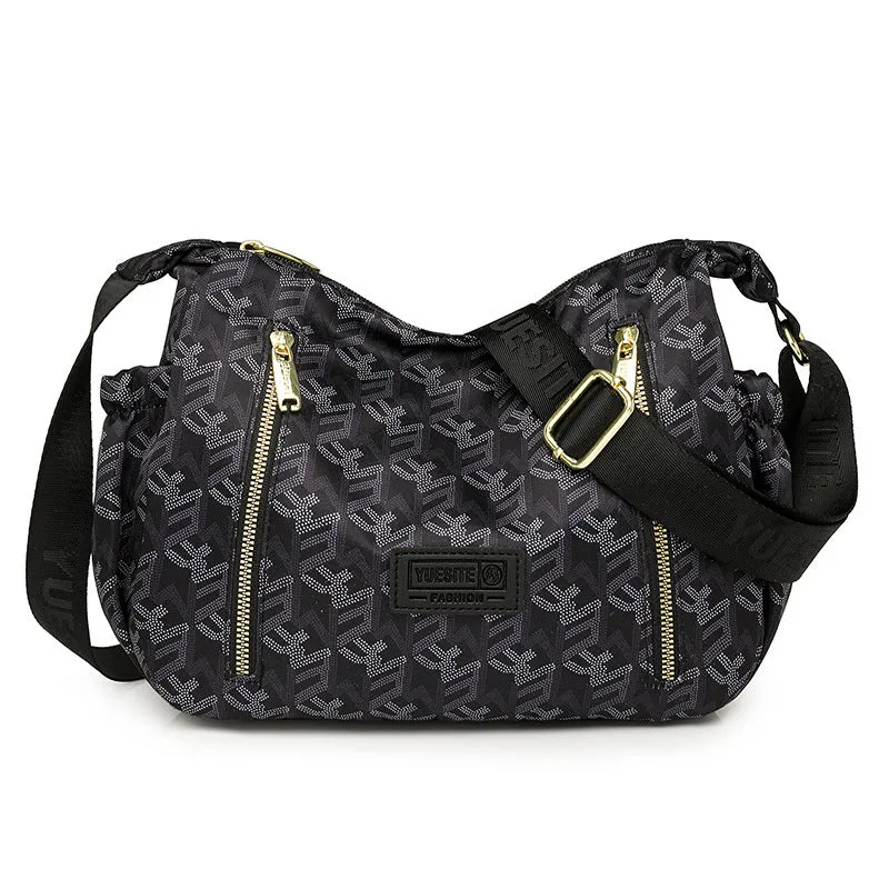 Graffiti casual crossbody bag in nylon with sewing line and print details, medium-soft build, single strap, dumpling shape