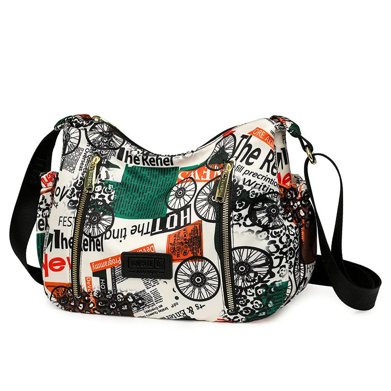 Graffiti casual crossbody bag in nylon with sewing line and print details, medium-soft build, single strap, dumpling shape