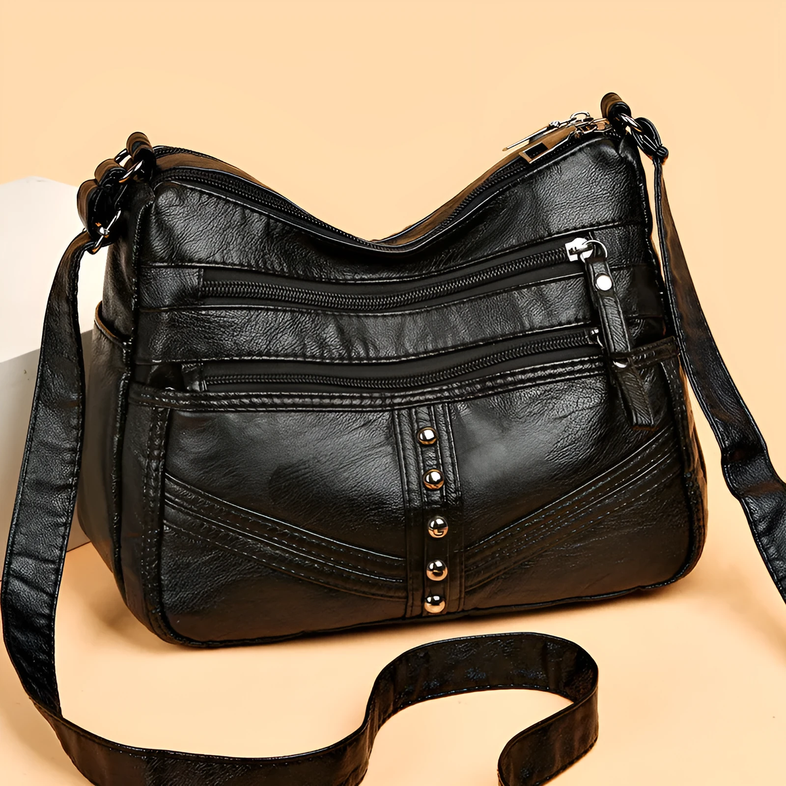 Ladies soft PU messenger bag in vintage style, available in black, brown, and red, horizontal square shape