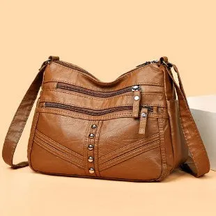 Ladies soft PU messenger bag in vintage style, available in black, brown, and red, horizontal square shape