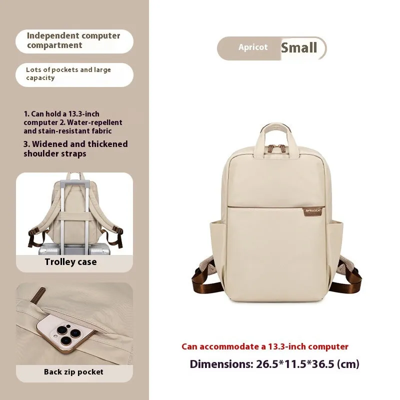 Large canvas travel backpack for women showing multiple internal compartments and zippered pockets