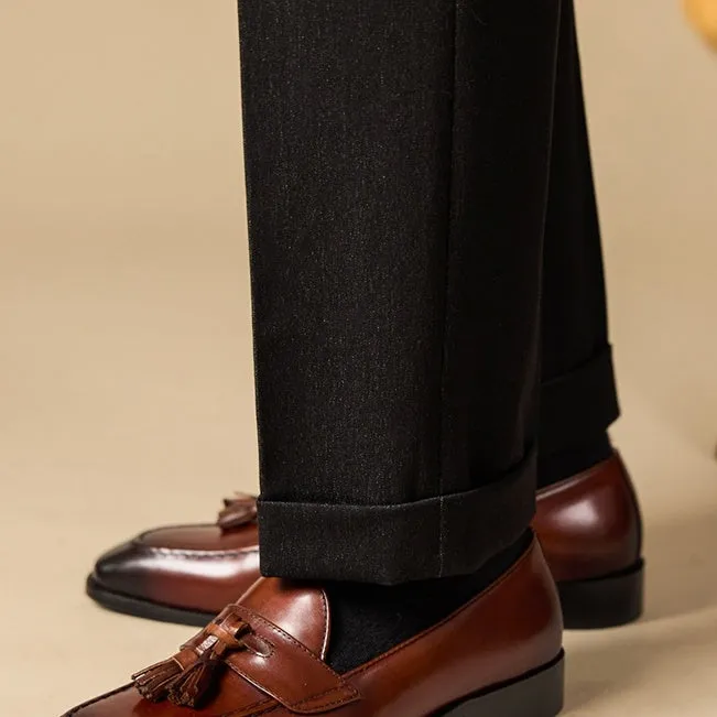 Men's polished leather tassel loafers in black and brown with pigskin lining and rubber sole