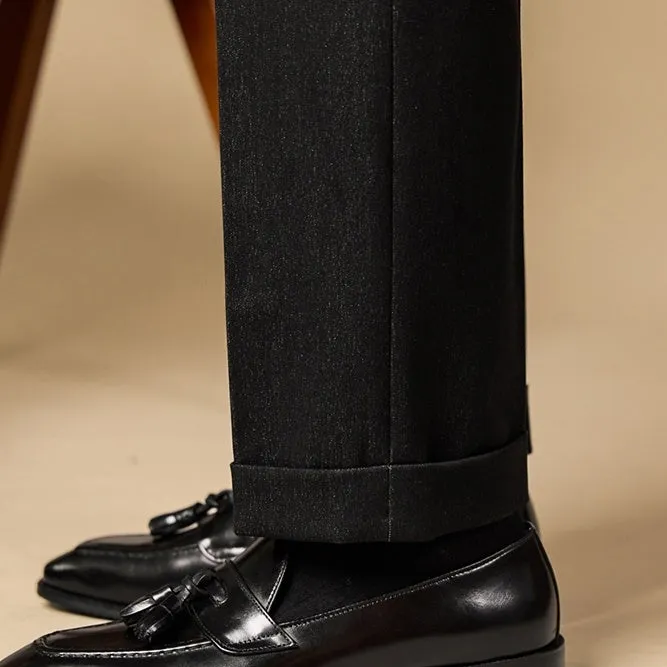 Men's polished leather tassel loafers in black and brown with pigskin lining and rubber sole
